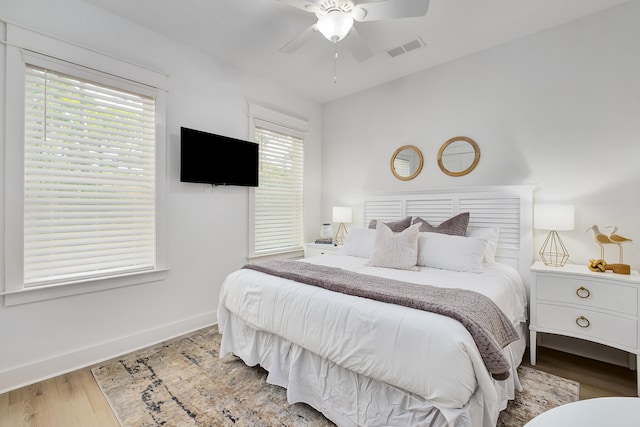 bedroom featuring ceiling fan and light hardwood / wood-style floors