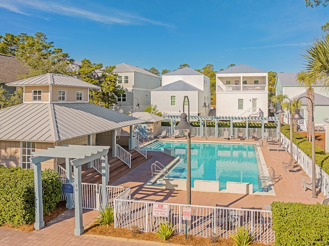 view of pool featuring a patio