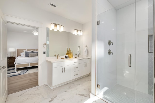 bathroom with tile flooring, walk in shower, ceiling fan, and double sink vanity