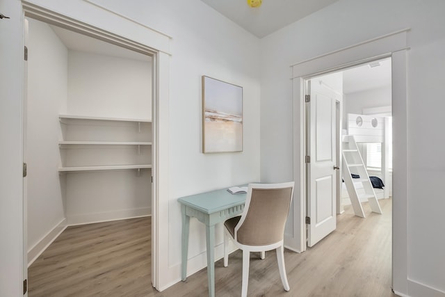 home office featuring light wood-type flooring