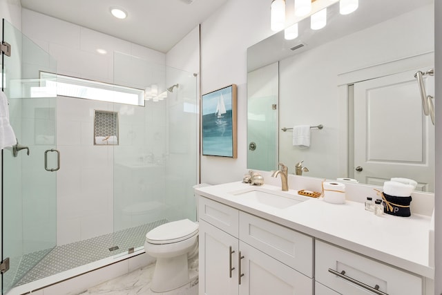 bathroom featuring walk in shower, oversized vanity, toilet, and tile floors