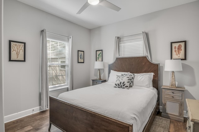 bedroom featuring ceiling fan and dark wood-type flooring