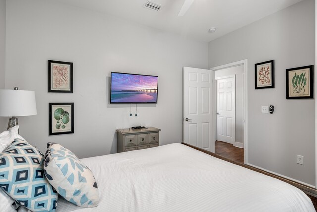 bedroom featuring dark hardwood / wood-style flooring