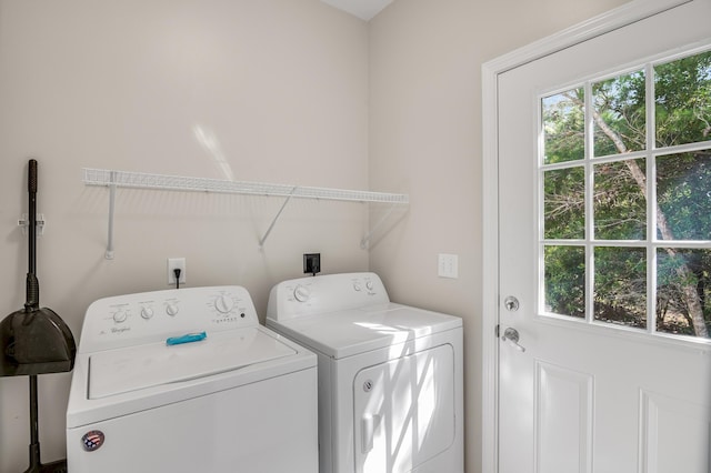 clothes washing area with washer and clothes dryer and hookup for an electric dryer