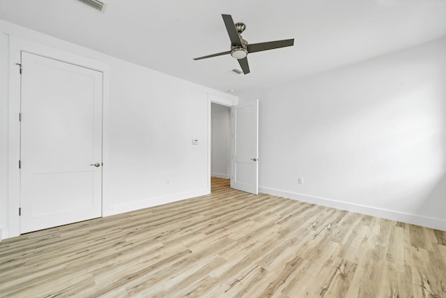 unfurnished bedroom featuring ceiling fan and light hardwood / wood-style flooring