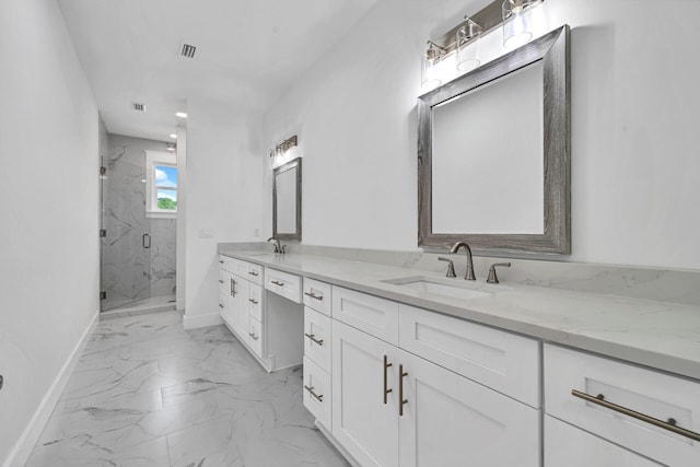 bathroom featuring vanity and an enclosed shower