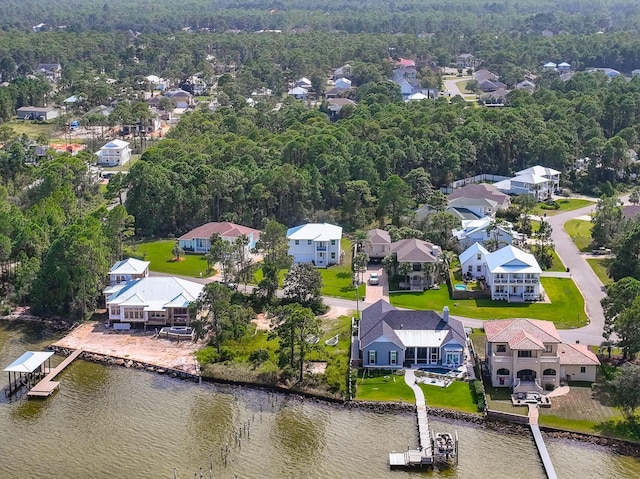 bird's eye view featuring a water view and a residential view