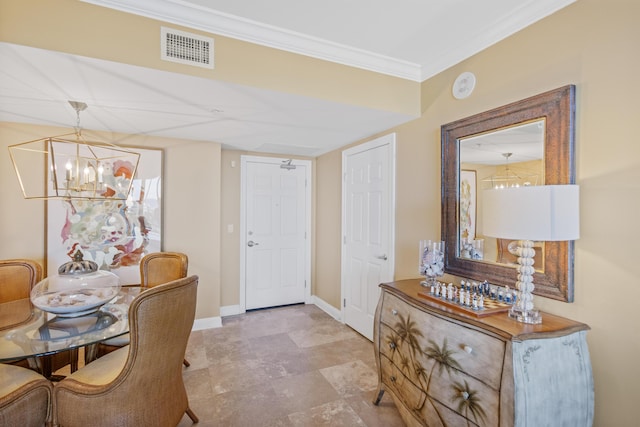 interior space with an inviting chandelier and crown molding