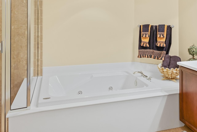 bathroom featuring a bathtub and vanity