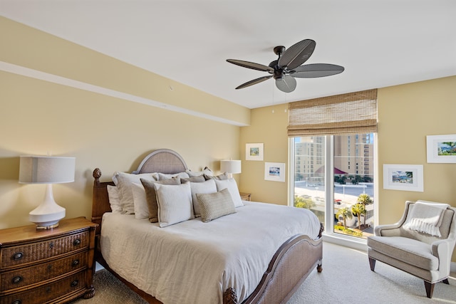 bedroom with ceiling fan and carpet floors