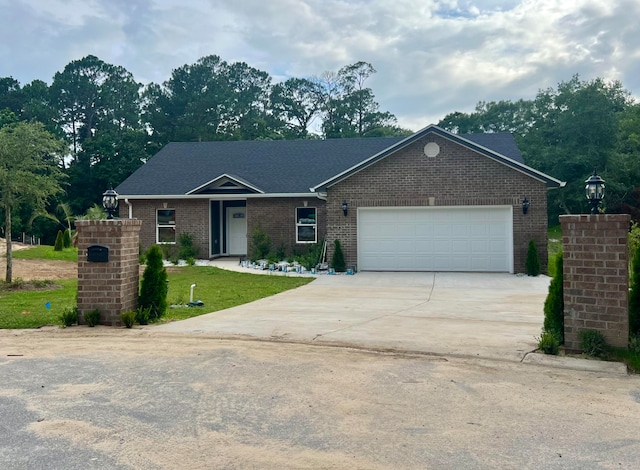 ranch-style home featuring a garage