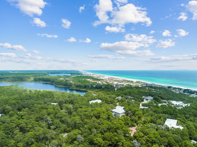 birds eye view of property featuring a view of the beach and a water view