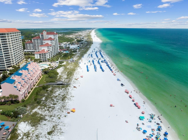 aerial view featuring a water view and a beach view