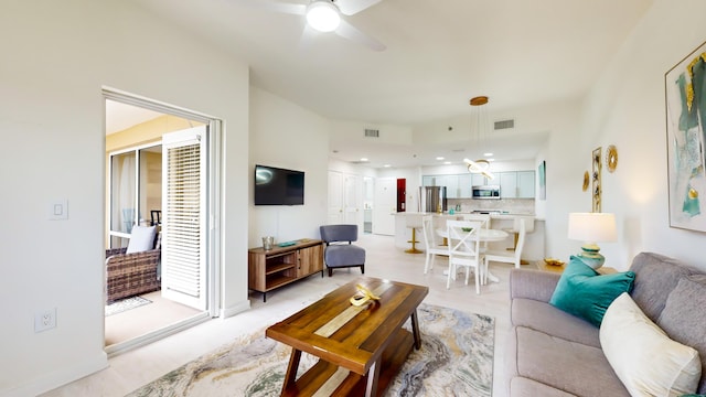 living room with ceiling fan