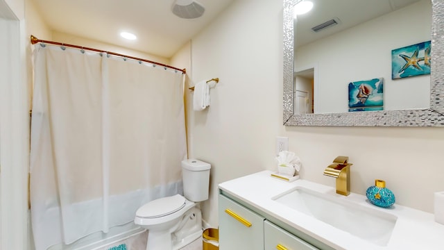 full bathroom with vanity, shower / bathtub combination with curtain, and toilet