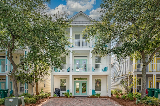 exterior space featuring french doors and a balcony