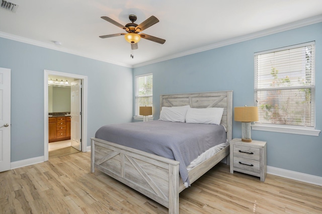 bedroom with ornamental molding, light hardwood / wood-style flooring, ceiling fan, and ensuite bathroom