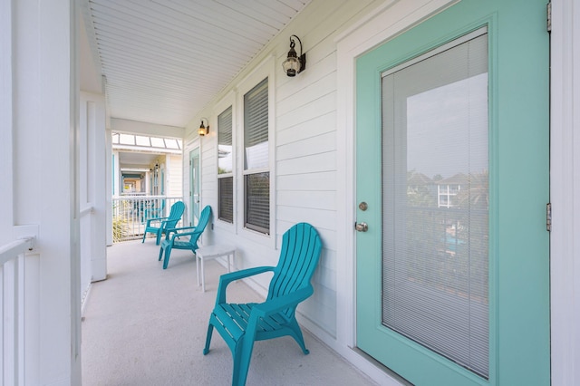 balcony featuring a porch