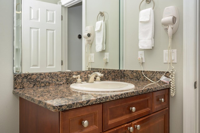 bathroom featuring large vanity