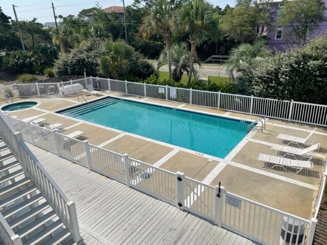 view of pool featuring a patio area