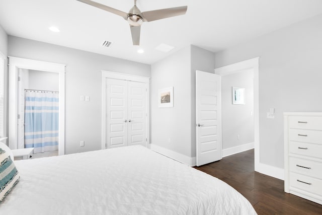 bedroom with a closet, dark wood-type flooring, and ceiling fan