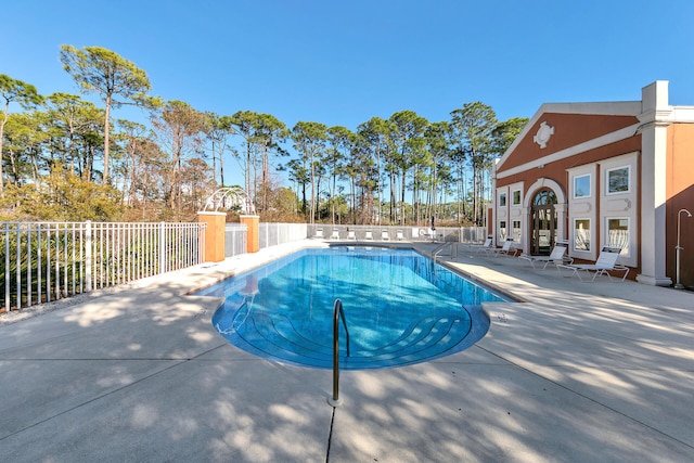 view of pool with a patio area