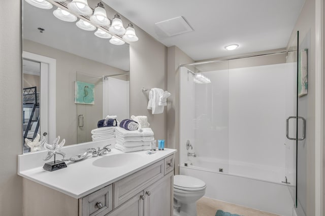 full bathroom with toilet, combined bath / shower with glass door, and vanity