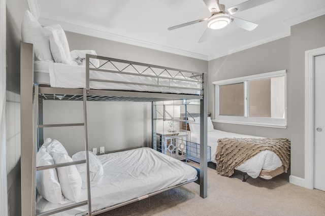 bedroom with light colored carpet, ceiling fan, and ornamental molding