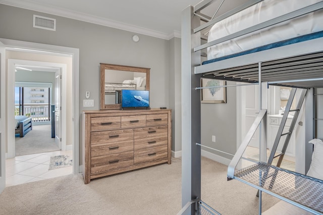 bedroom with light carpet and ornamental molding