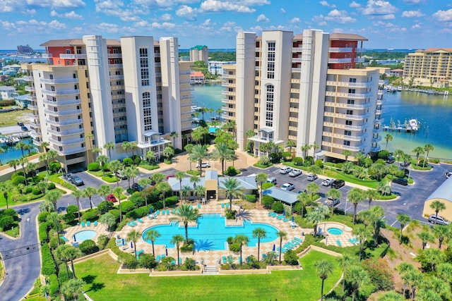 view of swimming pool featuring a water view