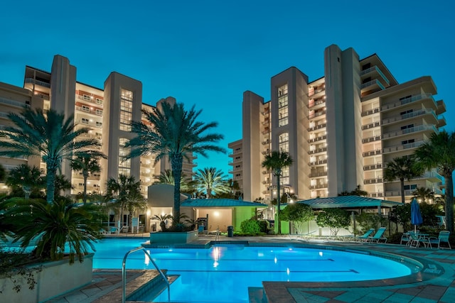 view of pool at night