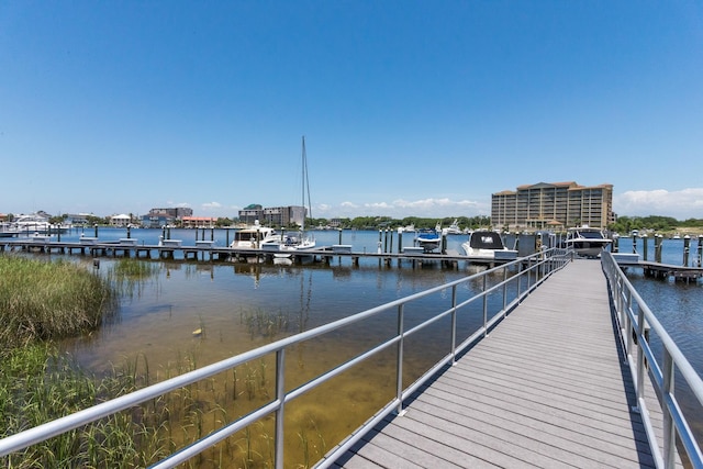 dock area featuring a water view