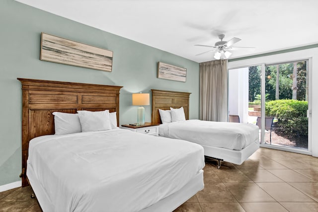 bedroom featuring access to outside, tile patterned floors, and ceiling fan