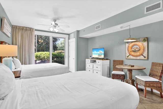 bedroom featuring access to exterior and ceiling fan