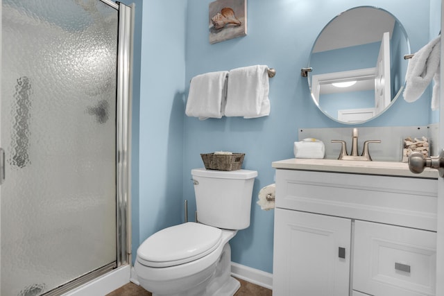 bathroom with walk in shower, oversized vanity, and toilet