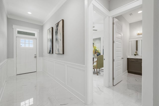 interior space featuring ornamental molding