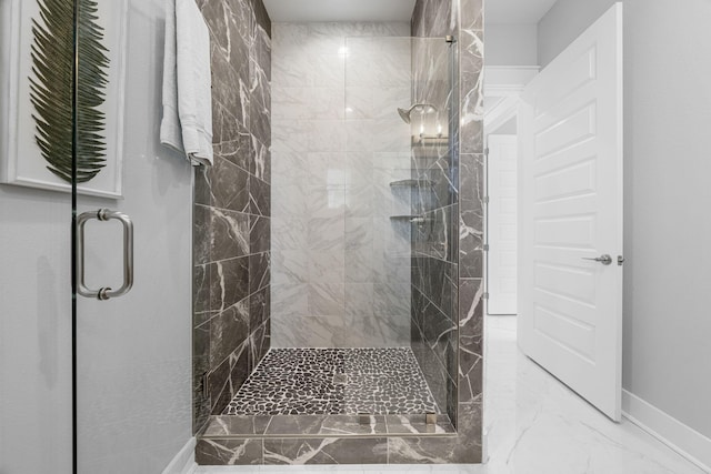 bathroom featuring an enclosed shower and tile flooring