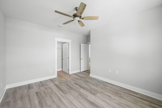 unfurnished room featuring ceiling fan and light wood-type flooring