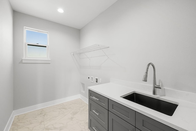 washroom featuring hookup for a washing machine, cabinets, electric dryer hookup, sink, and light tile floors