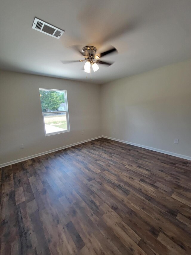 unfurnished room featuring ceiling fan and hardwood / wood-style flooring