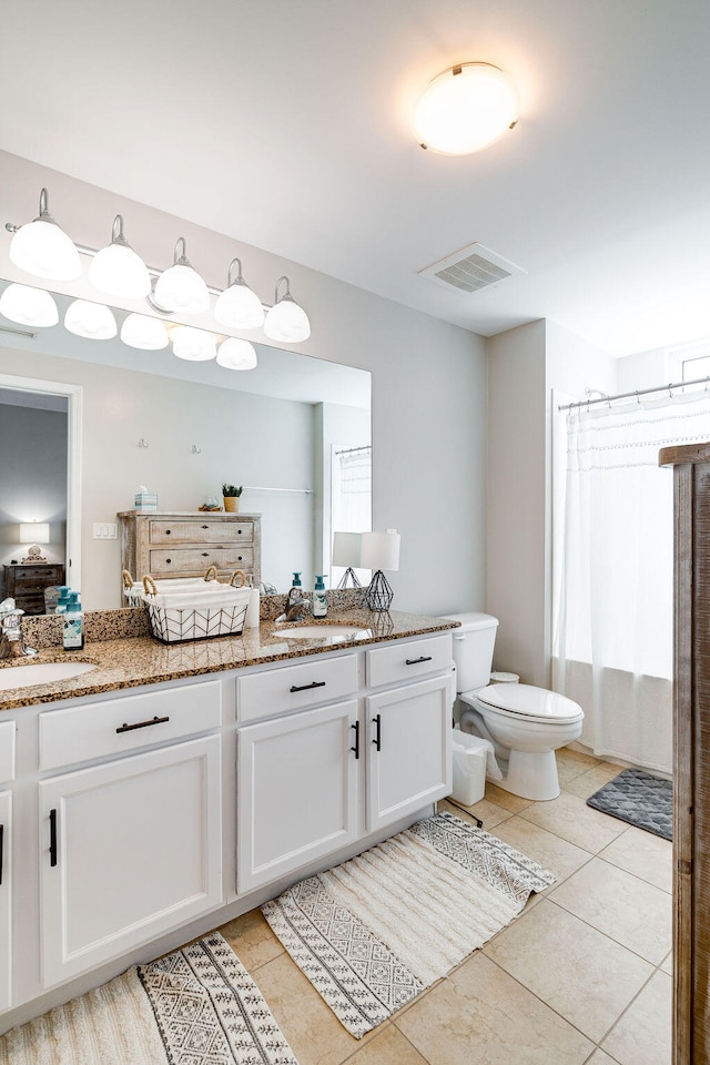 full bathroom with shower / tub combo with curtain, vanity, toilet, and tile flooring