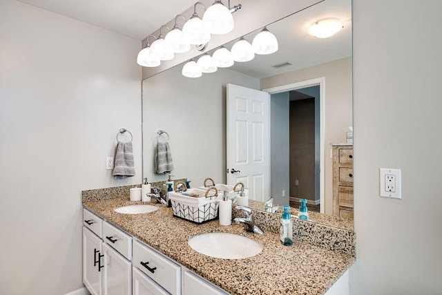 bathroom featuring double sink vanity