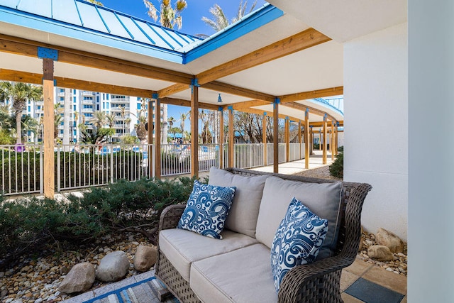 sunroom with beam ceiling