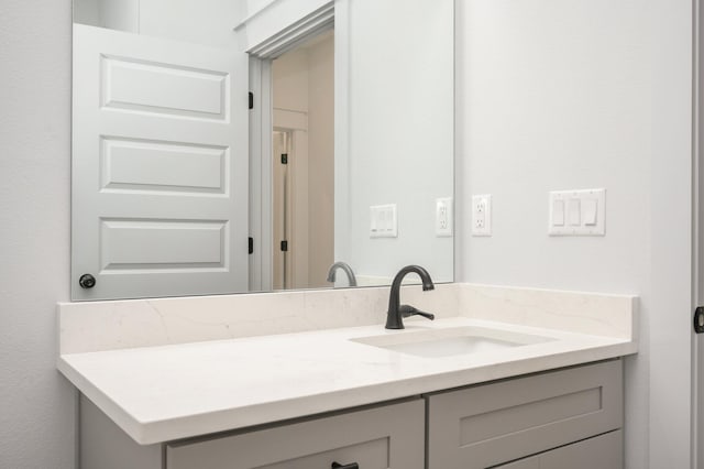 bathroom featuring oversized vanity