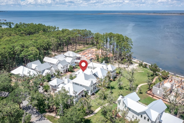 bird's eye view with a water view