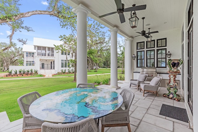 view of terrace featuring ceiling fan