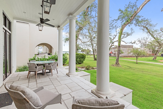 view of patio / terrace featuring ceiling fan