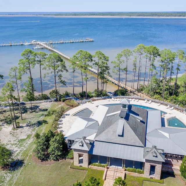 drone / aerial view with a water view