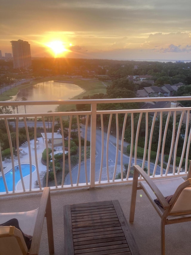 view of balcony at dusk