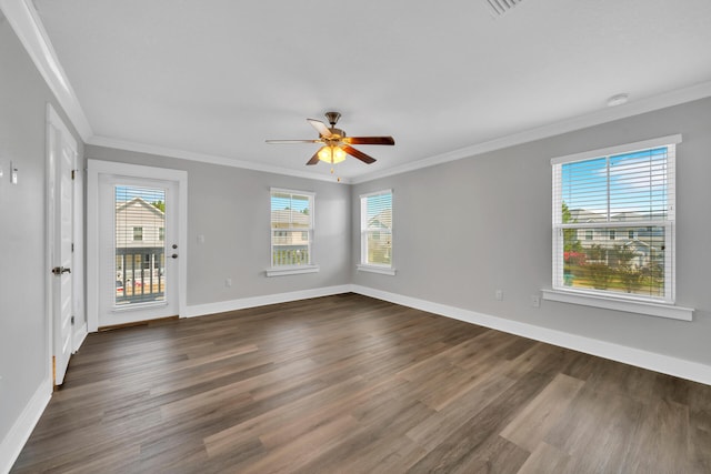 unfurnished room with dark hardwood / wood-style floors, ceiling fan, and ornamental molding